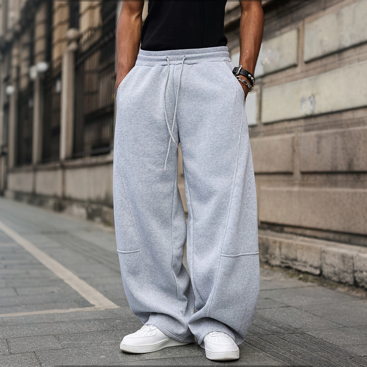 Classic Solid Color Baggy Jogger Pants For Men, Soft Thick Fabric Panel Cut Relaxed Wide Leg Long Trousers